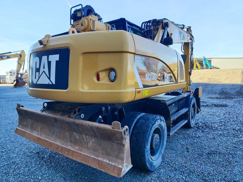 Caterpillar M318D MH - Escavatore gommato: foto 1 Caterpillar M318D MH - Escavatore gommato: foto 1