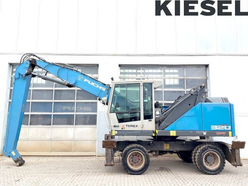 Fuchs MHL 320 F - Escavatore per movimentazione: foto 1 Fuchs MHL 320 F - Escavatore per movimentazione: foto 1