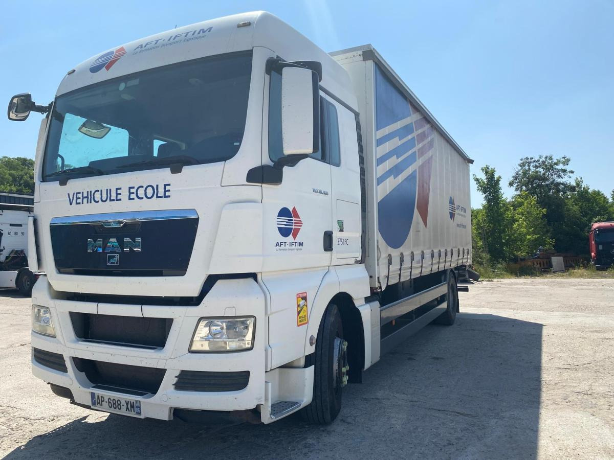 MAN TGX 18.360 - Camion centinato: foto 1 MAN TGX 18.360 - Camion centinato: foto 1