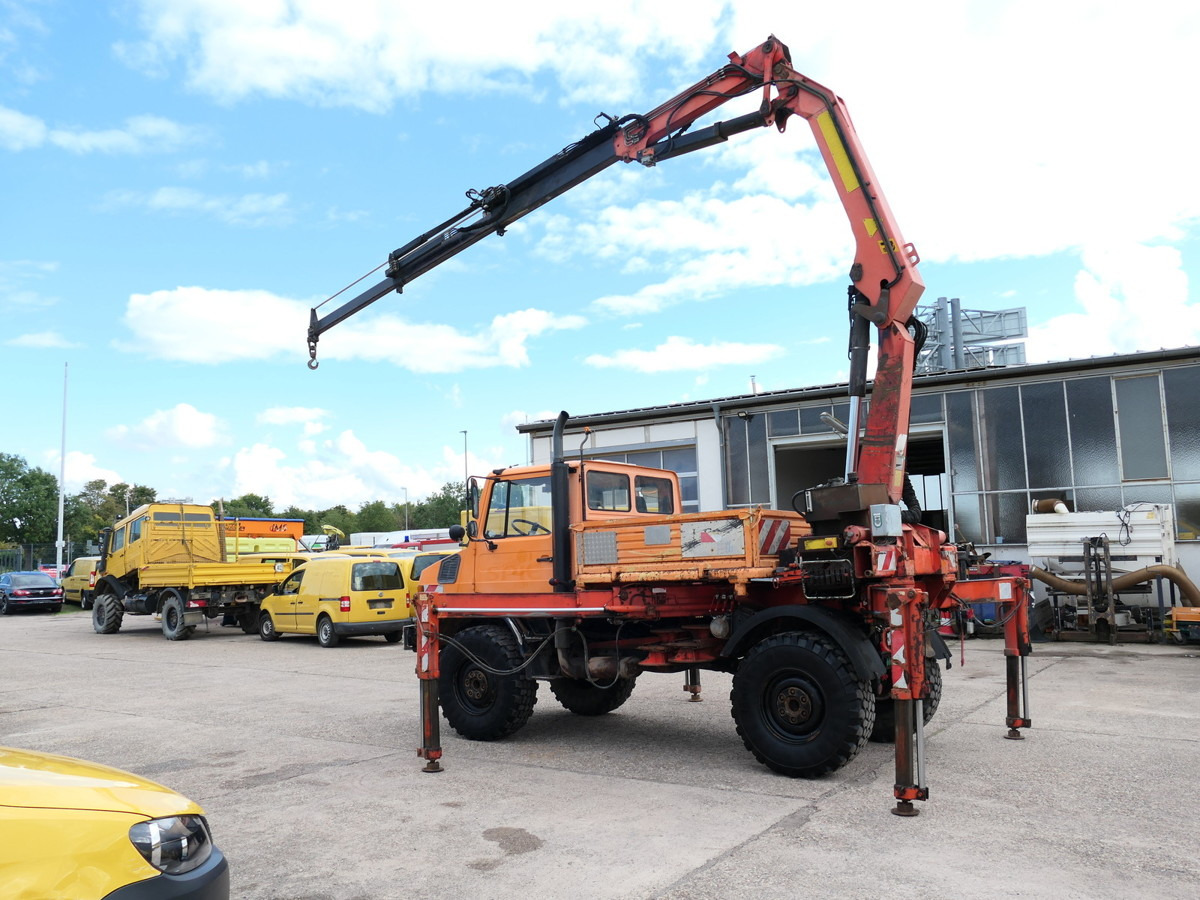 UNIMOG U1450 Palfinger PK 105B AHK STANDHEIZUNG - Autocarro con pianale/ Cassone fisso, Camion con gru: foto 1 UNIMOG U1450 Palfinger PK 105B AHK STANDHEIZUNG - Autocarro con pianale/ Cassone fisso, Camion con gru: foto 1