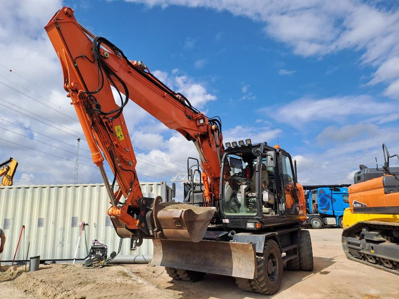 Escavatore gommato Hitachi ZX140WTB-6: foto 7