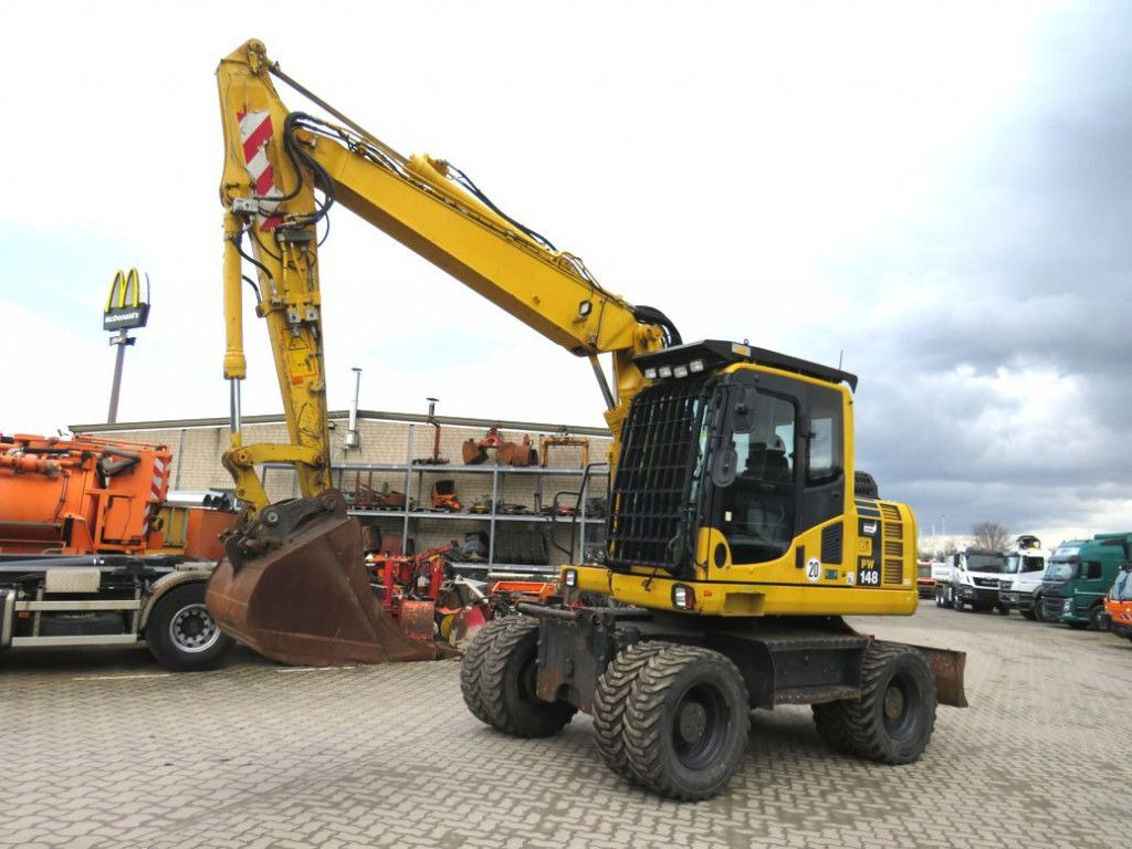 Komatsu Mobilbagger PW 148 - 8 Bagger 6.824h Deutsch top - Escavatore gommato: foto 1 Komatsu Mobilbagger PW 148 - 8 Bagger 6.824h Deutsch top - Escavatore gommato: foto 1