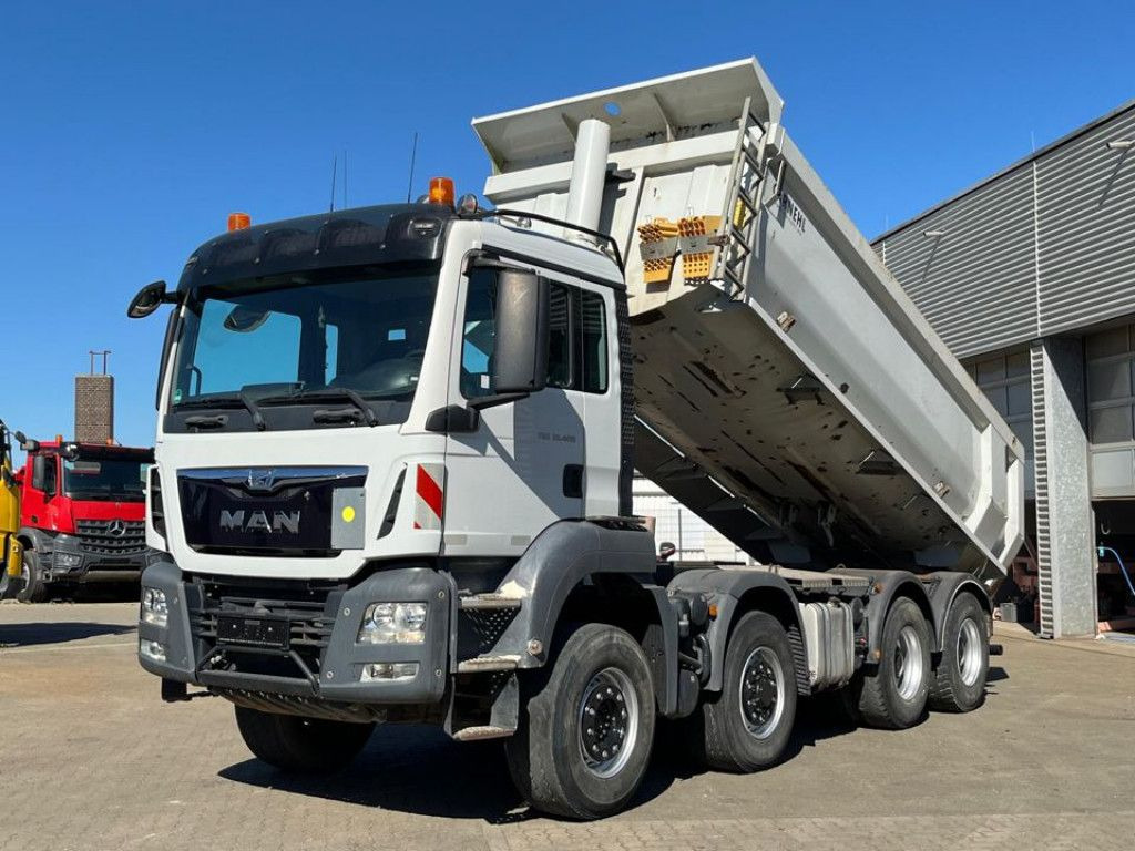 MAN TG-S 35.400 8x6H 4 Achs Muldenkipper Carnehl - Autocarro multibenna: foto 1 MAN TG-S 35.400 8x6H 4 Achs Muldenkipper Carnehl - Autocarro multibenna: foto 1