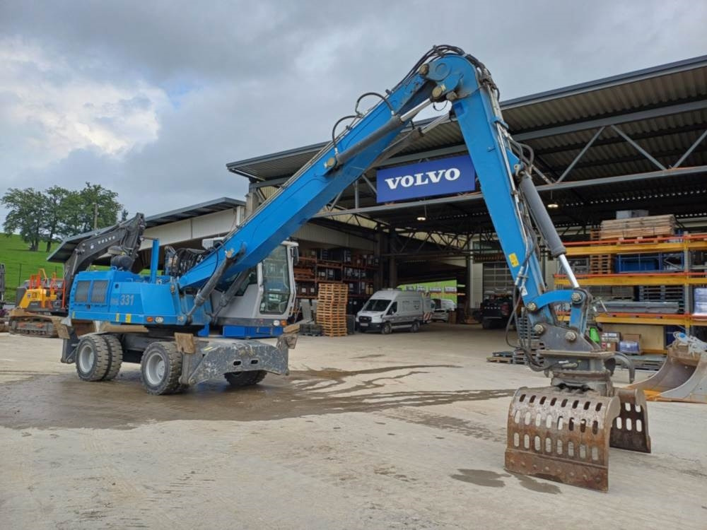 Fuchs MHL 331 - Escavatore per movimentazione: foto 1 Fuchs MHL 331 - Escavatore per movimentazione: foto 1