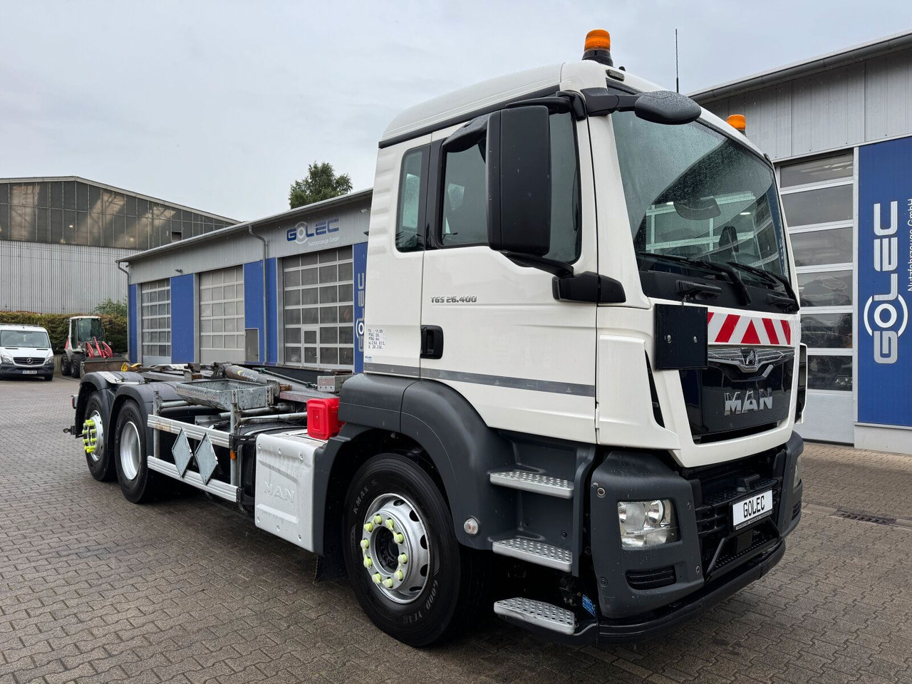 MAN TGS 26.400 6x2-4 Abrollkipper Lift-Lenkachse - Autocarro scarrabile, Camion con gru: foto 1 MAN TGS 26.400 6x2-4 Abrollkipper Lift-Lenkachse - Autocarro scarrabile, Camion con gru: foto 1