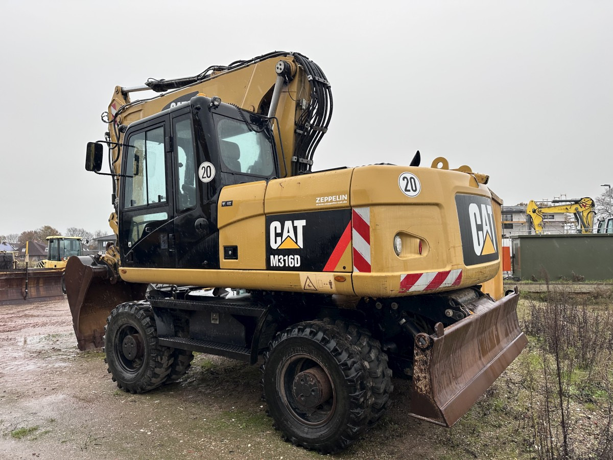 CATERPILLAR M 316 D full Hydr. Top Zustand German machine ! - Escavatore gommato: foto 2 CATERPILLAR M 316 D full Hydr. Top Zustand German machine ! - Escavatore gommato: foto 2
