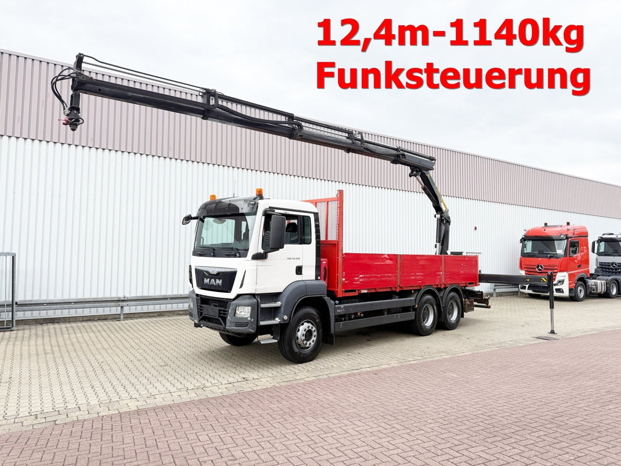 MAN TGS 33.400 6x4 BB TGS 33.400 6x4 BB, Navi, Heckkran PK18002-EH C, Funk - Camion con gru, Autocarro con pianale/ Cassone fisso: foto 1 MAN TGS 33.400 6x4 BB TGS 33.400 6x4 BB, Navi, Heckkran PK18002-EH C, Funk - Camion con gru, Autocarro con pianale/ Cassone fisso: foto 1