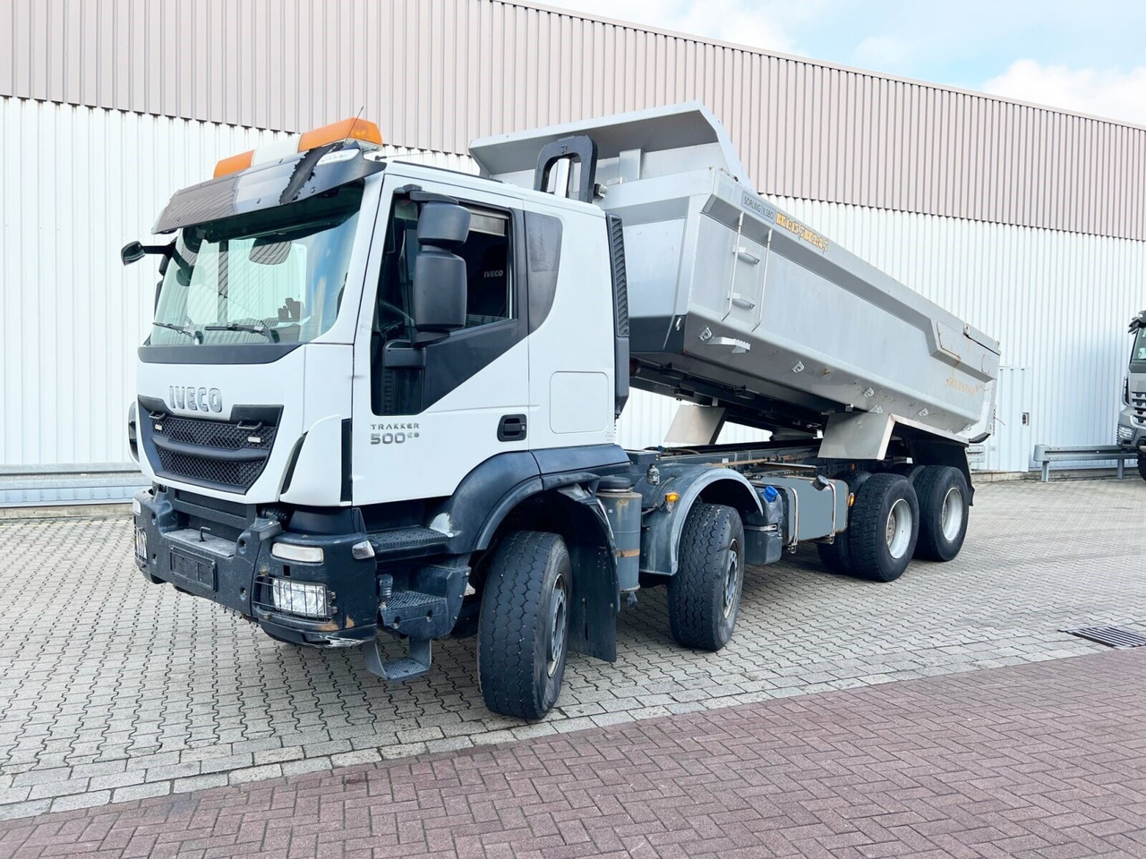Trakker AT410T50 8x4 Trakker AT410T50 8x4, Stahlmulde ca. 16m³, hydr. Heckklappe - Autocarro ribaltabile: foto 1 Trakker AT410T50 8x4 Trakker AT410T50 8x4, Stahlmulde ca. 16m³, hydr. Heckklappe - Autocarro ribaltabile: foto 1