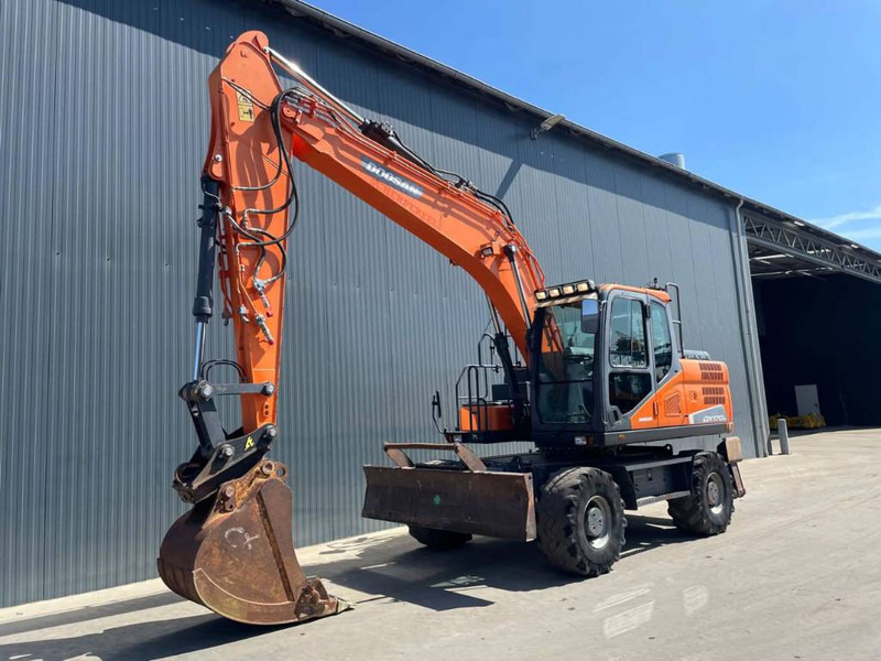 Doosan DX170W-5 - Escavatore gommato: foto 1 Doosan DX170W-5 - Escavatore gommato: foto 1