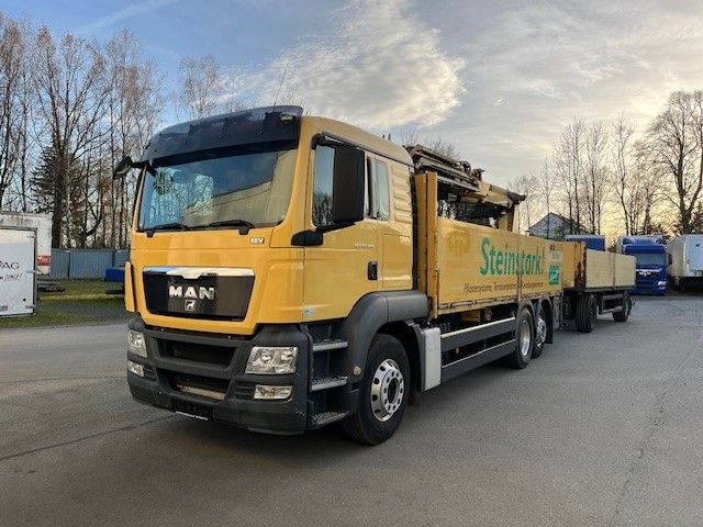 MAN TGS 26.400 Baustoff LKW mit Ladekran Atlas 210.2 MAN TGS 26.400 Baustoff LKW mit Ladekran Atlas 210.2 - Autocarro con pianale/ Cassone fisso, Camion con gru: foto 1 MAN TGS 26.400 Baustoff LKW mit Ladekran Atlas 210.2 MAN TGS 26.400 Baustoff LKW mit Ladekran Atlas 210.2 - Autocarro con pianale/ Cassone fisso, Camion con gru: foto 1