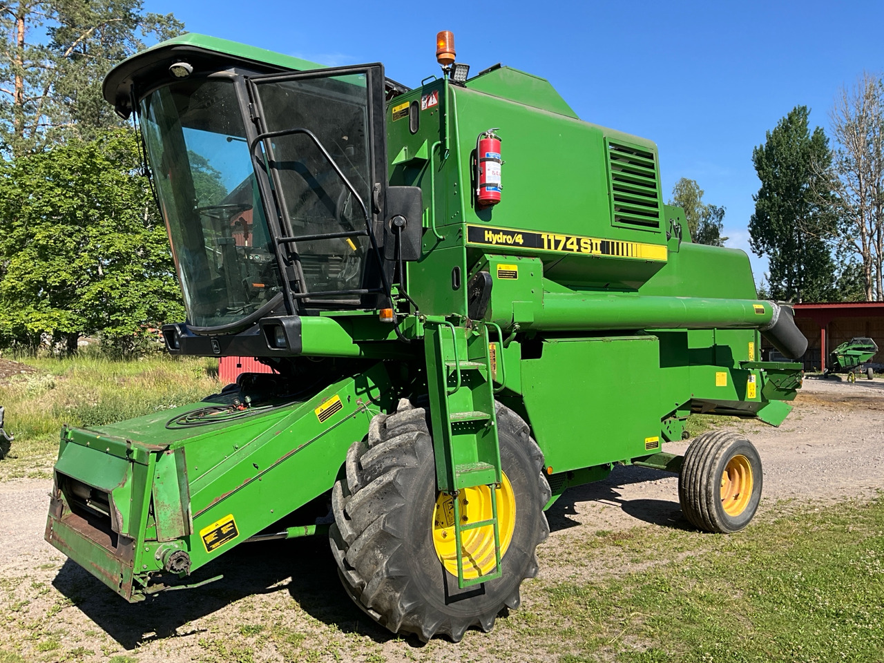 John Deere 1174 S2 Hydro4 - Mietitrebbia: foto 1 John Deere 1174 S2 Hydro4 - Mietitrebbia: foto 1