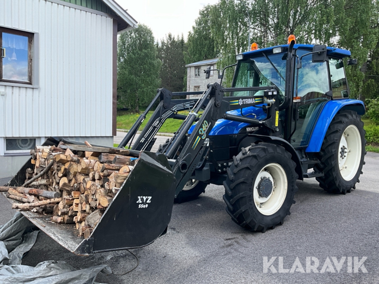 New Holland TL 70 - Trattore: foto 1 New Holland TL 70 - Trattore: foto 1