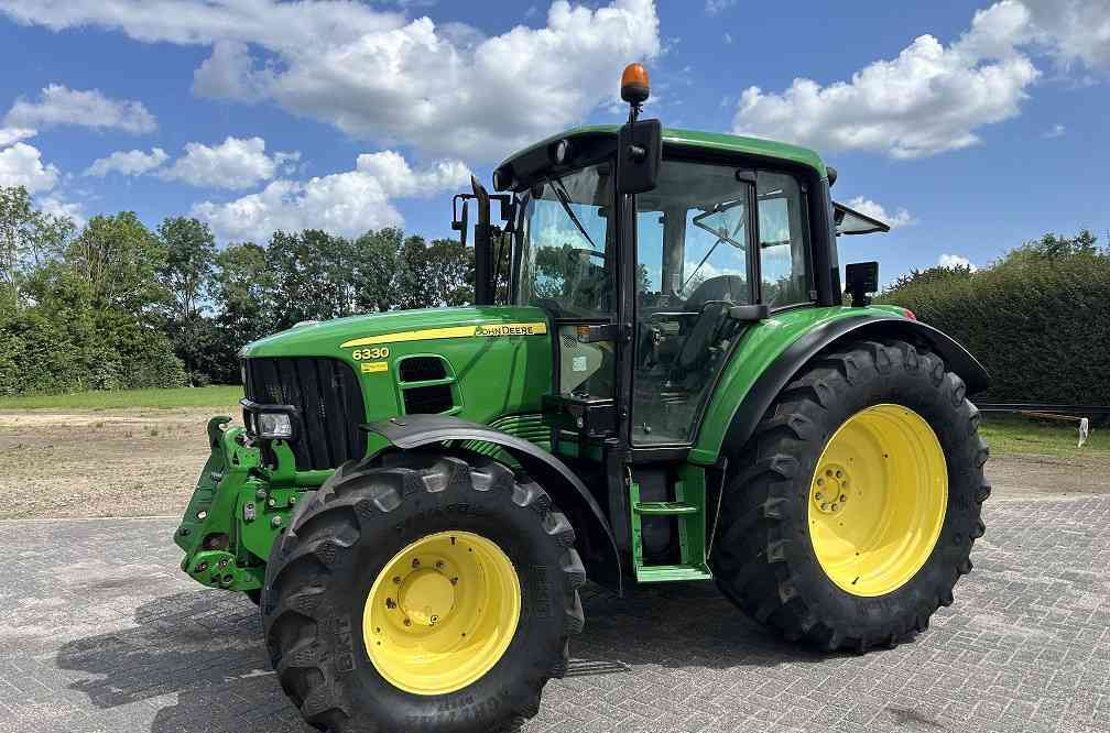John Deere 6330, powerquad, tls, airco, fronthef - Trattore: foto 1 John Deere 6330, powerquad, tls, airco, fronthef - Trattore: foto 1