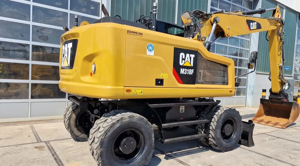 Caterpillar M318F, 2019 ROK, IMPORT NIEMCY - Escavatore gommato: foto 1 Caterpillar M318F, 2019 ROK, IMPORT NIEMCY - Escavatore gommato: foto 1