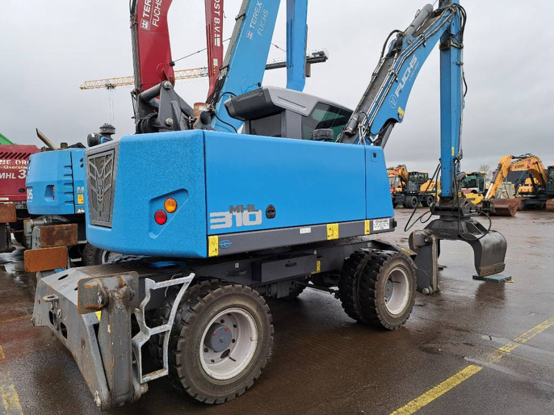 Fuchs MHL310F + Grapple - Escavatore per movimentazione: foto 1 Fuchs MHL310F + Grapple - Escavatore per movimentazione: foto 1