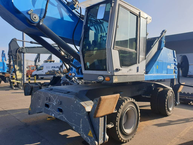 Escavatore per movimentazione per il trasporto di rifiuti Fuchs MHL350D: foto 7
