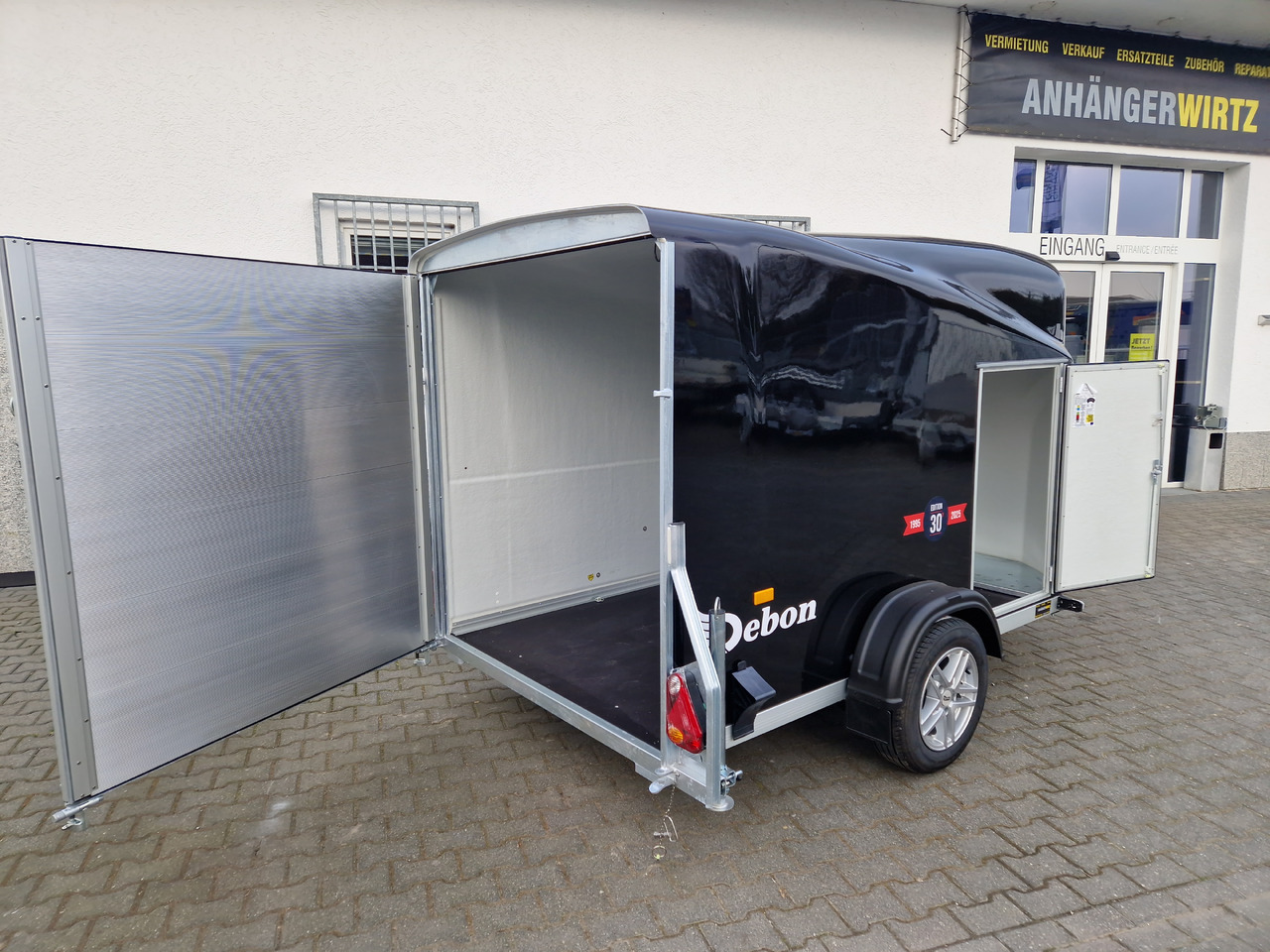 Rimorchio per auto Debon Cargo 1300 300x152x168cm black Seitentür Alufelgen silver Pullman II 100km/H 1300kg Modell 25: foto 17