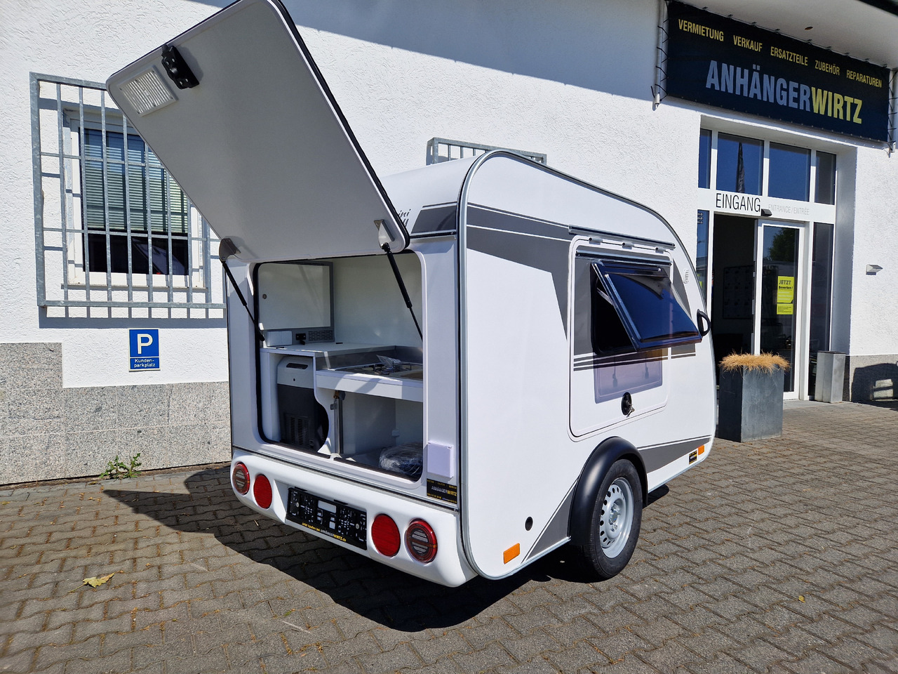 Caravan Mini Camper Mini Tommy TMC25 252x140x121cm aero V1 Küche 12V/230V 100km/H 750kg gebremst Modell 24: foto 16