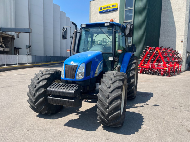 New Holland TL 100 A - Trattore: foto 1 New Holland TL 100 A - Trattore: foto 1