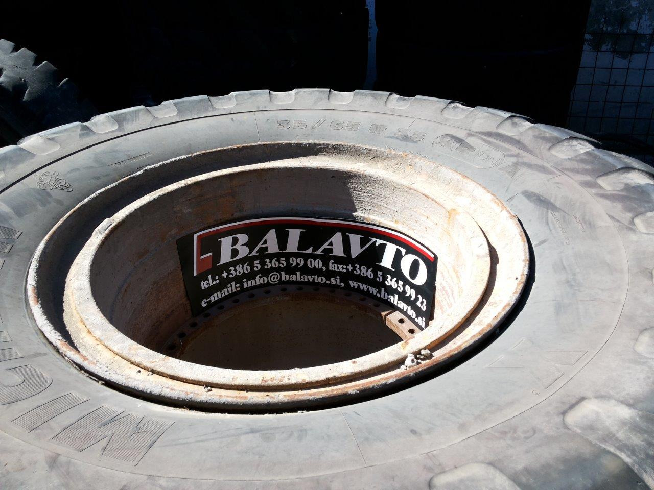 Caterpillar 988B - Ruota completa per Macchina da cantiere: foto 1 Caterpillar 988B - Ruota completa per Macchina da cantiere: foto 1