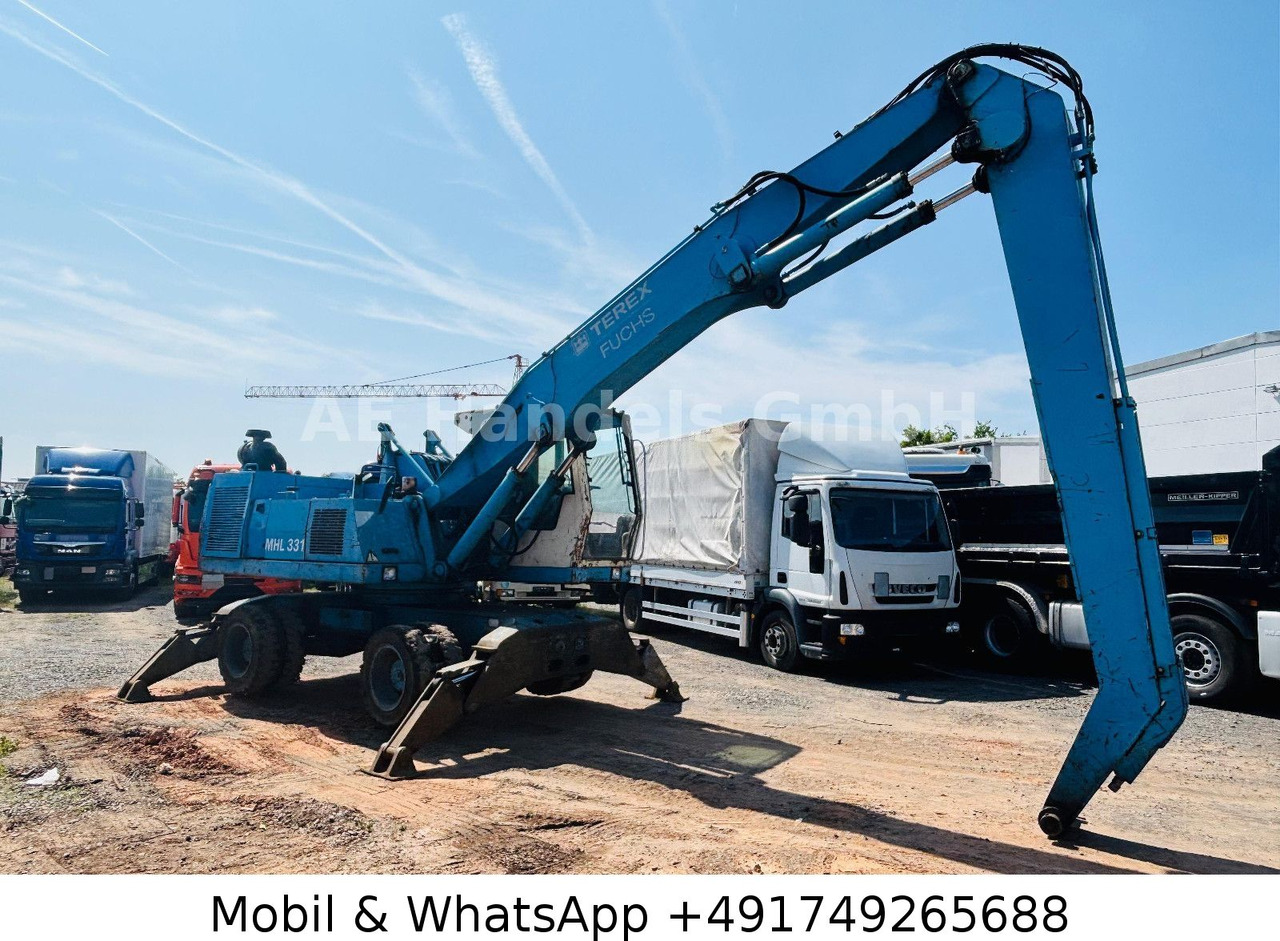 Terex MHL 331 Umschlagbagger - Escavatore gommato: foto 1 Terex MHL 331 Umschlagbagger - Escavatore gommato: foto 1