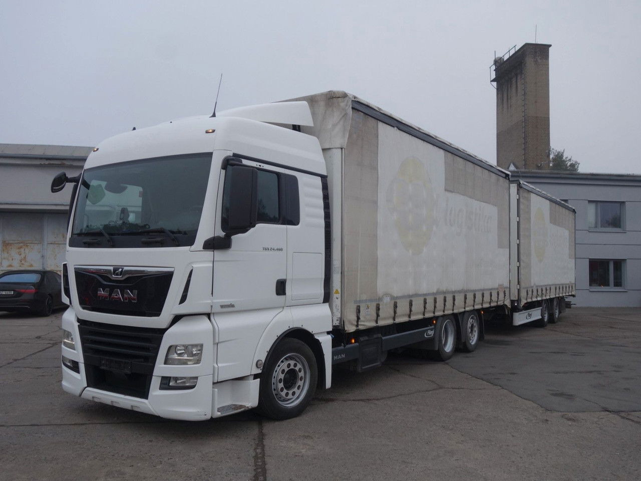 MAN TGX 24 24.460 6x2 120cm3, Durchfahren - Camion centinato: foto 1 MAN TGX 24 24.460 6x2 120cm3, Durchfahren - Camion centinato: foto 1
