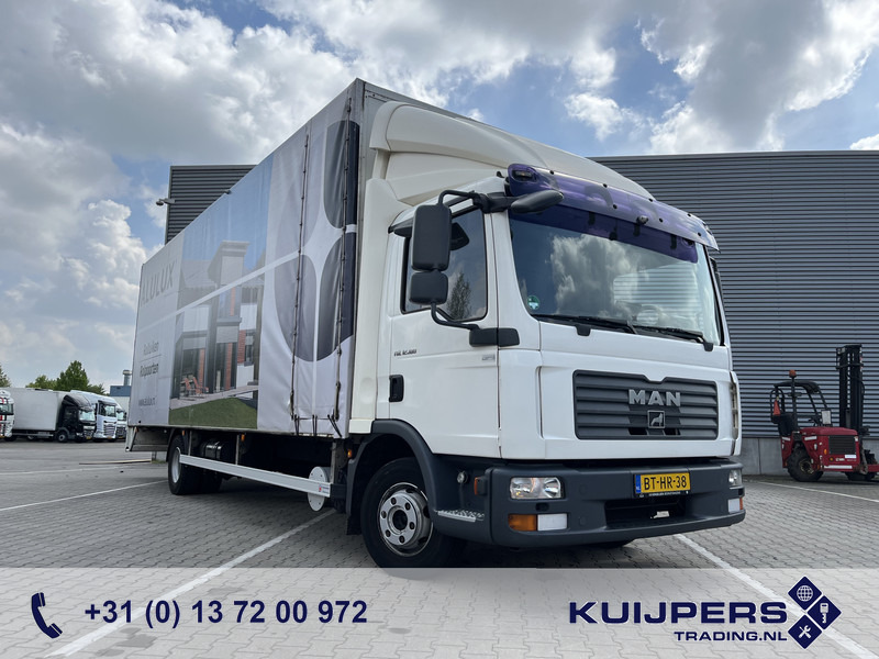 MAN TGL 12.180 / 12 Ton / 781 dkm / Oil Leak / Canvas Box / NL Truck - Autocarro furgonato: foto 1 MAN TGL 12.180 / 12 Ton / 781 dkm / Oil Leak / Canvas Box / NL Truck - Autocarro furgonato: foto 1