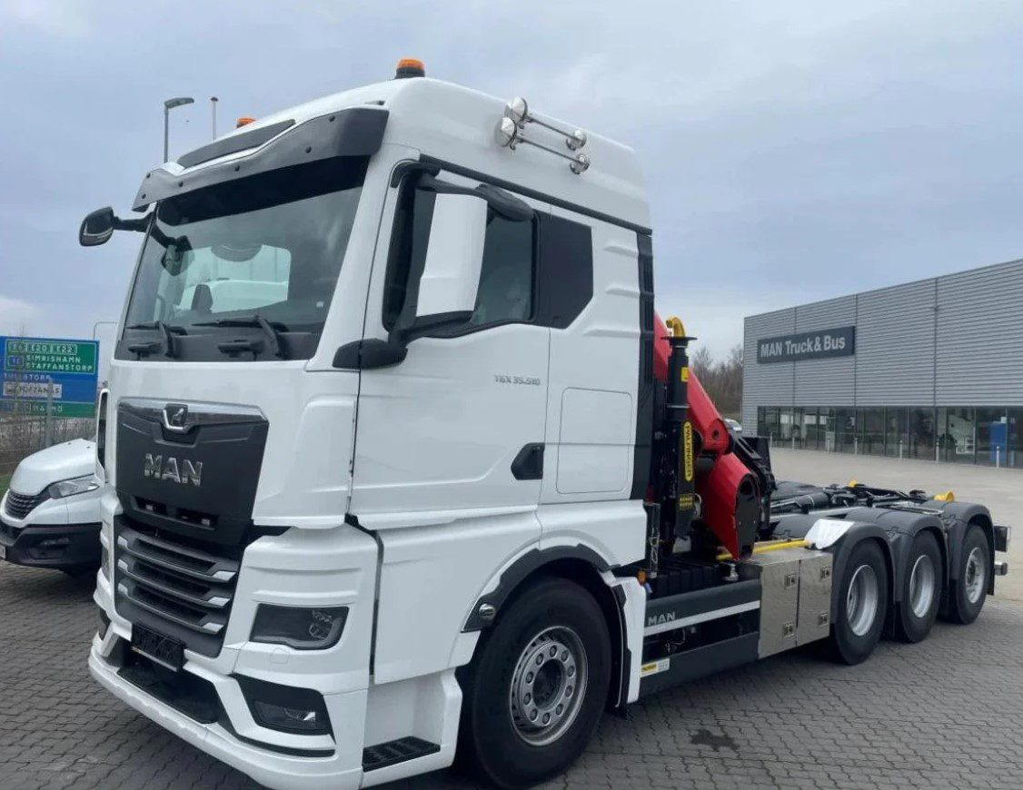 MAN TGS 35.510 8×4 Tridem kranväxlare Palfinger - Autocarro scarrabile, Camion con gru: foto 1 MAN TGS 35.510 8×4 Tridem kranväxlare Palfinger - Autocarro scarrabile, Camion con gru: foto 1