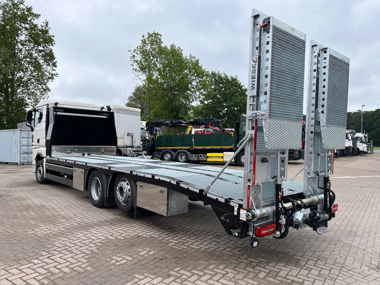 MAN Baumaschinen-  Arbeitsbühnentransporter Rampen - Carro attrezzi: foto 1 MAN Baumaschinen-  Arbeitsbühnentransporter Rampen - Carro attrezzi: foto 1