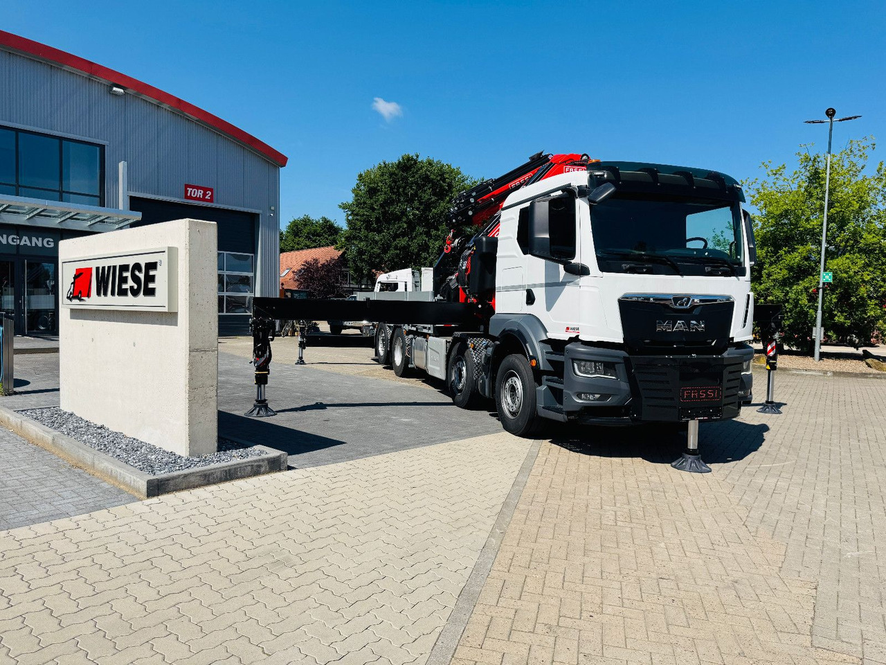 MAN TGS 32.510 mit F710 Frontkran sofort - Camion con gru: foto 2 MAN TGS 32.510 mit F710 Frontkran sofort - Camion con gru: foto 2