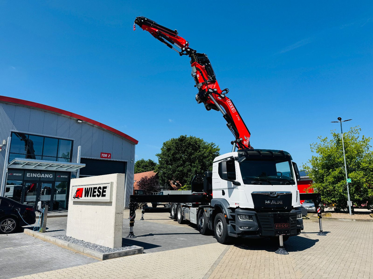 MAN TGS 32.510 mit F710 Frontkran sofort - Autocarro con pianale/ Cassone fisso, Camion con gru: foto 1 MAN TGS 32.510 mit F710 Frontkran sofort - Autocarro con pianale/ Cassone fisso, Camion con gru: foto 1