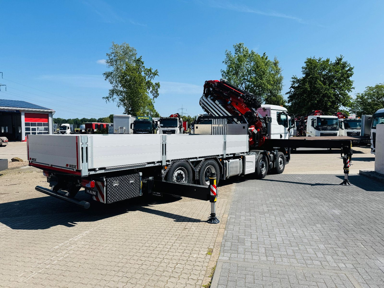 MAN TGS 32.510 mit F710 Frontkran sofort - Camion con gru: foto 4 MAN TGS 32.510 mit F710 Frontkran sofort - Camion con gru: foto 4