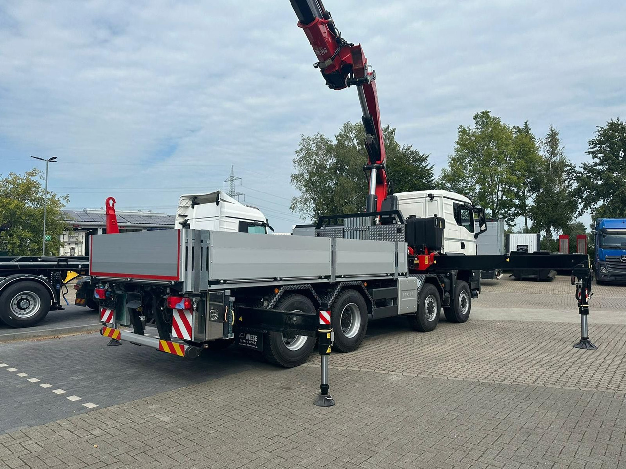 MAN TGS 41.520 8x8 mit Fassi Ladekran F710RA.2.26 - Autocarro con pianale/ Cassone fisso: foto 3 MAN TGS 41.520 8x8 mit Fassi Ladekran F710RA.2.26 - Autocarro con pianale/ Cassone fisso: foto 3