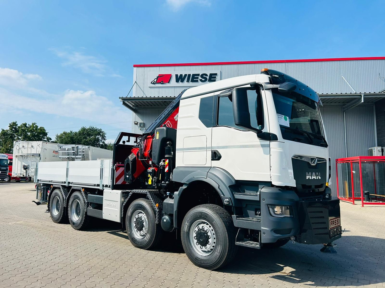 MAN TGS 41.520 8x8 mit Fassi Ladekran F710RA.2.26 - Autocarro con pianale/ Cassone fisso: foto 4 MAN TGS 41.520 8x8 mit Fassi Ladekran F710RA.2.26 - Autocarro con pianale/ Cassone fisso: foto 4