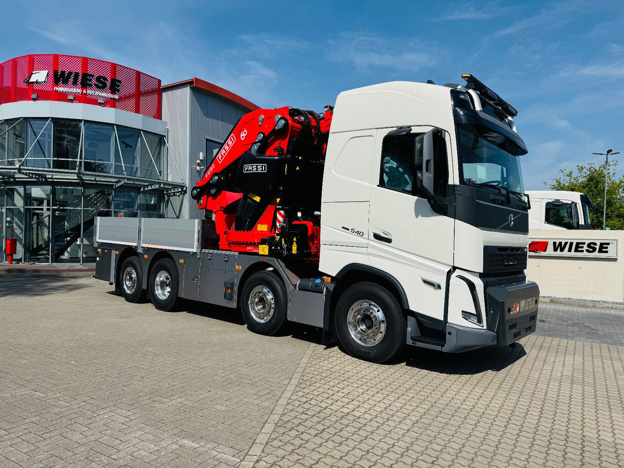 Volvo FH 540 mit Fassi F2150RAL Fly Jib + Winde - Autocarro con pianale/ Cassone fisso, Camion con gru: foto 3 Volvo FH 540 mit Fassi F2150RAL Fly Jib + Winde - Autocarro con pianale/ Cassone fisso, Camion con gru: foto 3