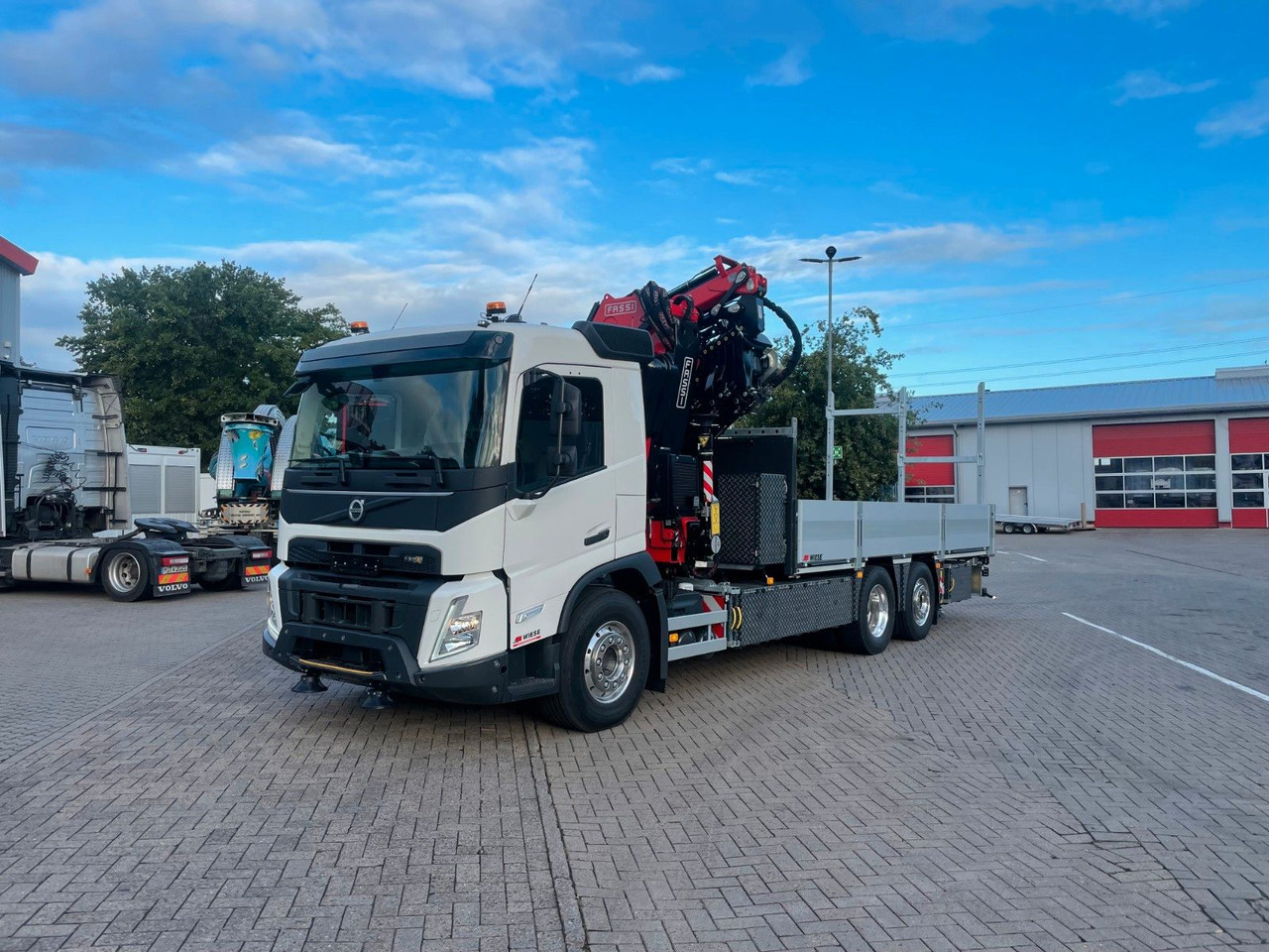 Volvo FMX 500 FASSI Ladekran F545 JIB & Winde Sofort - Autocarro con pianale/ Cassone fisso, Camion con gru: foto 1 Volvo FMX 500 FASSI Ladekran F545 JIB & Winde Sofort - Autocarro con pianale/ Cassone fisso, Camion con gru: foto 1