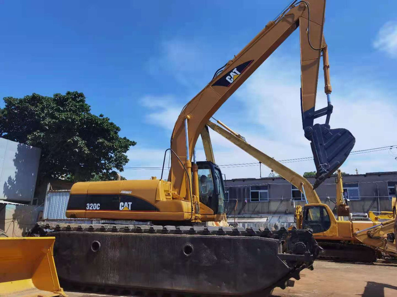 CATERPILLAR 320C - Escavatore anfibio: foto 1 CATERPILLAR 320C - Escavatore anfibio: foto 1