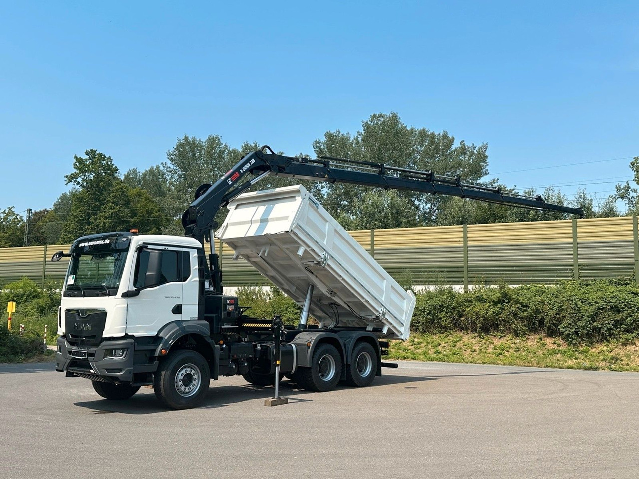 MAN TGS 33.440 6x4 /3-Seiten- Kipper / HIAB 228-6 - Autocarro ribaltabile, Camion con gru: foto 2 MAN TGS 33.440 6x4 /3-Seiten- Kipper / HIAB 228-6 - Autocarro ribaltabile, Camion con gru: foto 2
