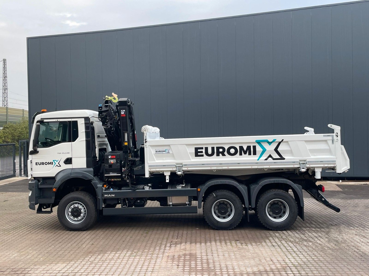 MAN TGS 33.440 6x6 /3-Seiten- Kipper / HIAB 228-6 - Autocarro ribaltabile, Camion con gru: foto 2 MAN TGS 33.440 6x6 /3-Seiten- Kipper / HIAB 228-6 - Autocarro ribaltabile, Camion con gru: foto 2