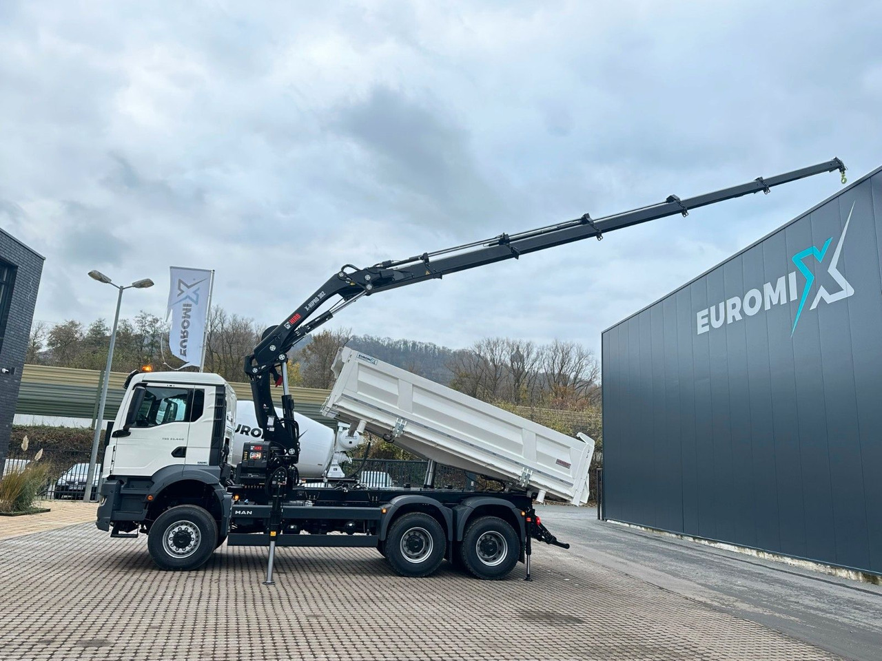 MAN TGS 33.440 6x6 /3-Seiten- Kipper / Kran HIAB 302 - Autocarro ribaltabile, Camion con gru: foto 1 MAN TGS 33.440 6x6 /3-Seiten- Kipper / Kran HIAB 302 - Autocarro ribaltabile, Camion con gru: foto 1