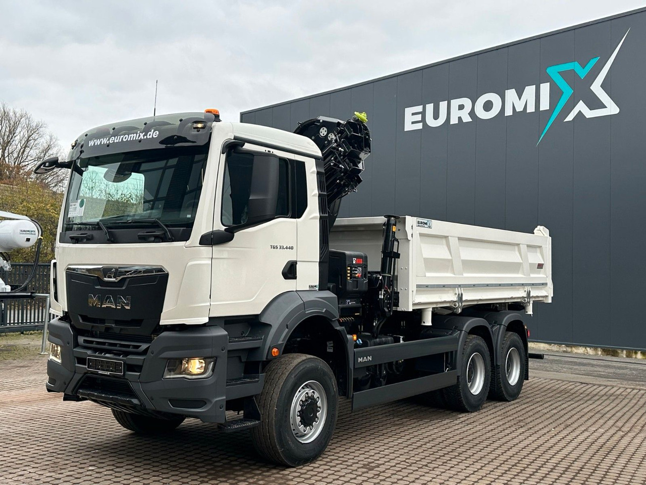 MAN TGS 33.440 6x6 /3-Seiten- Kipper / Kran HIAB 302 - Autocarro ribaltabile, Camion con gru: foto 2 MAN TGS 33.440 6x6 /3-Seiten- Kipper / Kran HIAB 302 - Autocarro ribaltabile, Camion con gru: foto 2