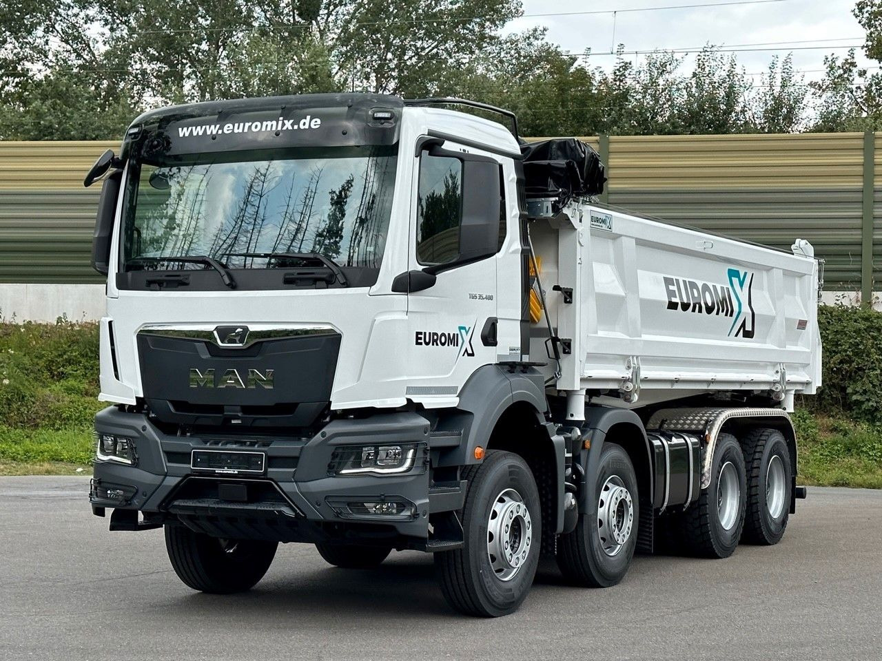 MAN TGS 35.480 8x4 EuromixMTP 3-Seiten-Kipper - Autocarro ribaltabile: foto 2 MAN TGS 35.480 8x4 EuromixMTP 3-Seiten-Kipper - Autocarro ribaltabile: foto 2