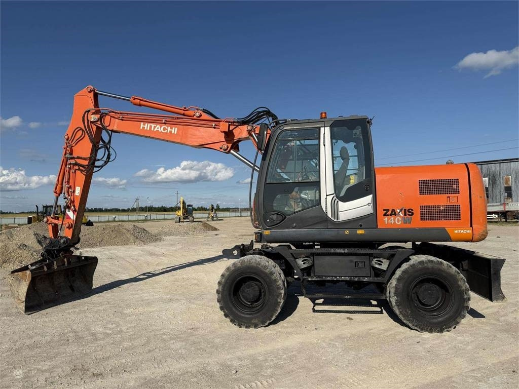 Hitachi ZX 140 W - Escavatore gommato: foto 3 Hitachi ZX 140 W - Escavatore gommato: foto 3