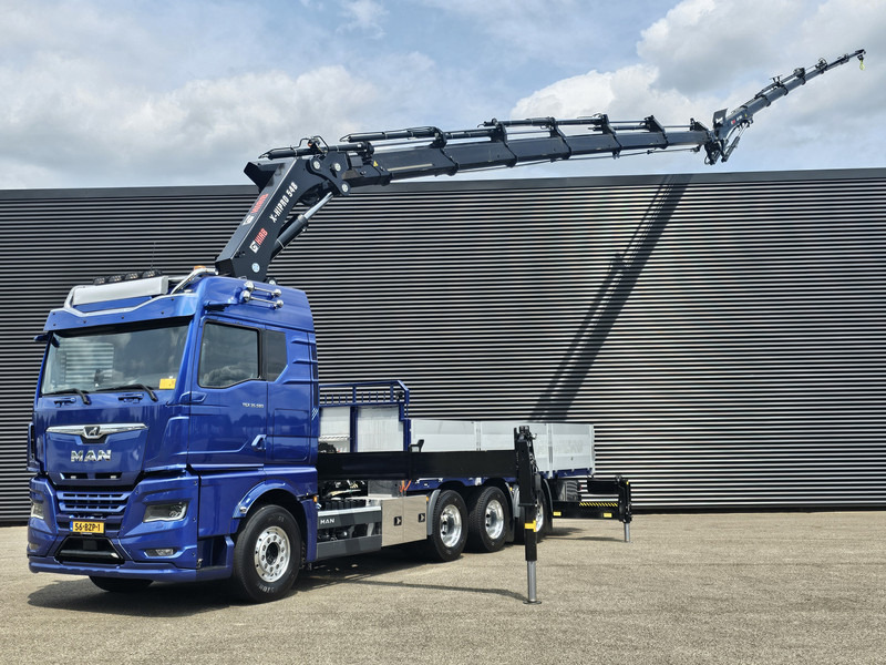 MAN TGX 35.580 / 8x4-4 / HIAB 50TM CRANE+ JIB - Camion con gru: foto 1 MAN TGX 35.580 / 8x4-4 / HIAB 50TM CRANE+ JIB - Camion con gru: foto 1