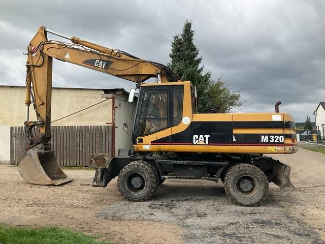 CAT M320 - Escavatore gommato: foto 1 CAT M320 - Escavatore gommato: foto 1