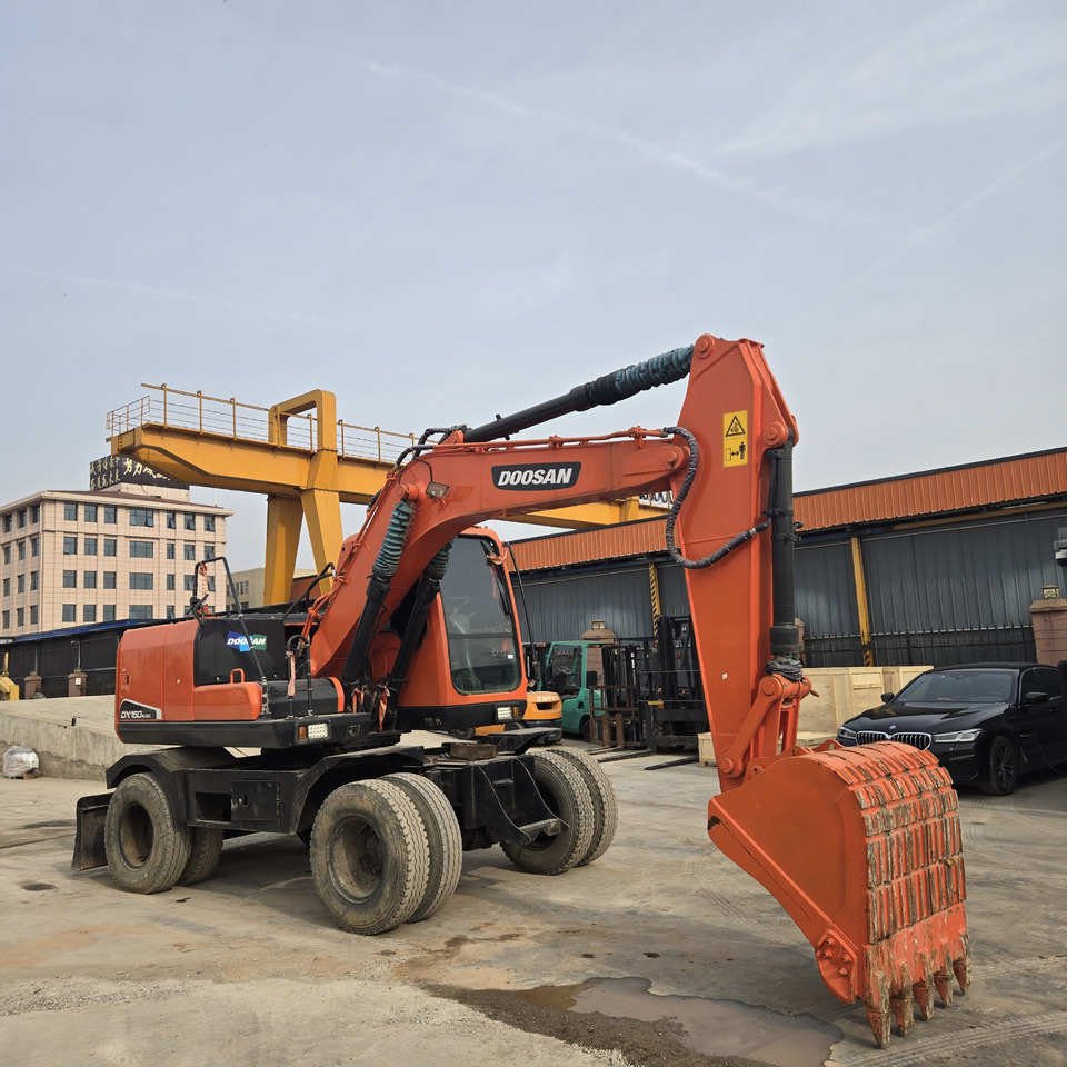 DOOSAN DX150W - Escavatore gommato: foto 1 DOOSAN DX150W - Escavatore gommato: foto 1