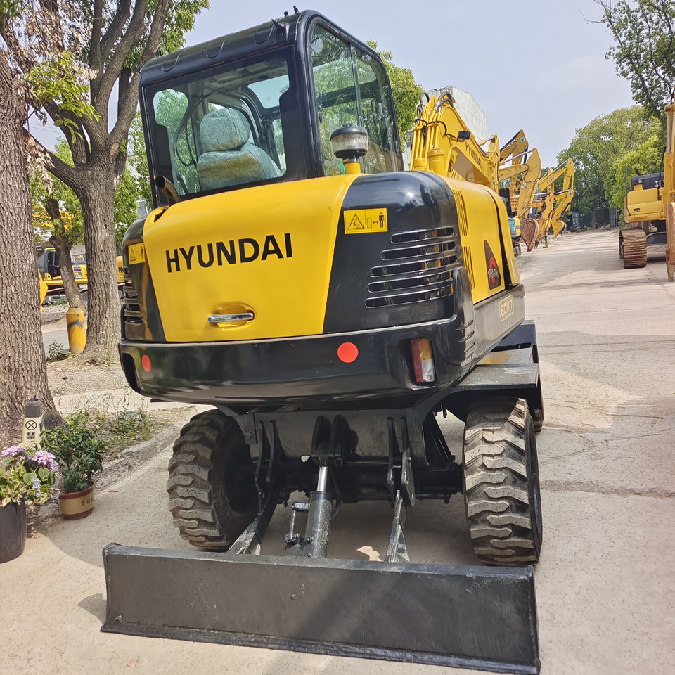 HYUNDAI R 60W - 7 R60W-7 - Escavatore gommato: foto 4 HYUNDAI R 60W - 7 R60W-7 - Escavatore gommato: foto 4