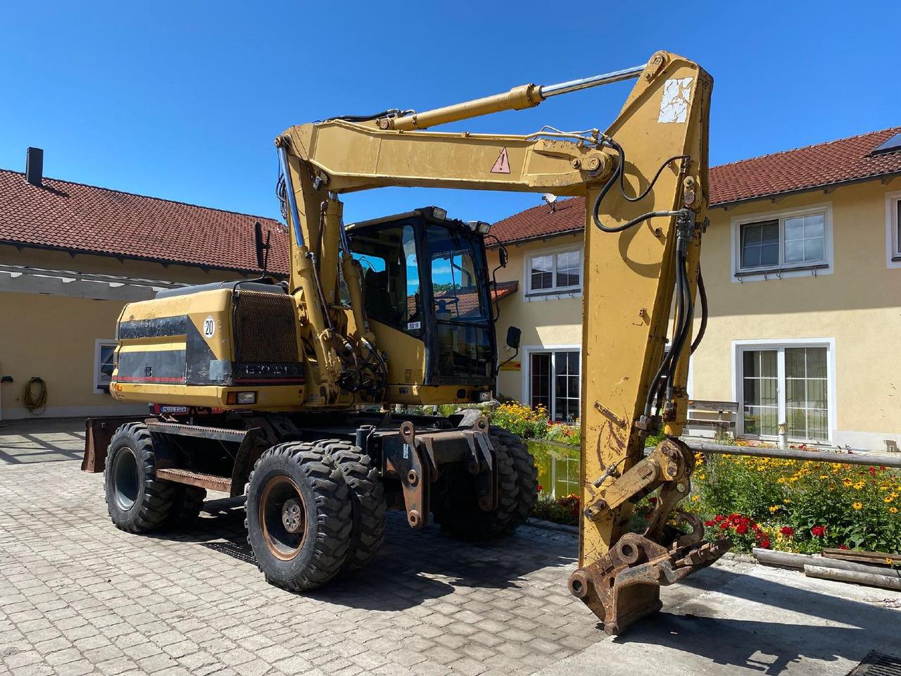 Caterpillar M 312 - Escavatore gommato: foto 1 Caterpillar M 312 - Escavatore gommato: foto 1