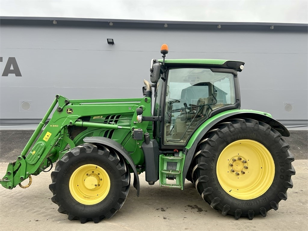 John Deere 6125 R AUTOPOWER ETUKUORMAAJALLA - Trattore: foto 1 John Deere 6125 R AUTOPOWER ETUKUORMAAJALLA - Trattore: foto 1