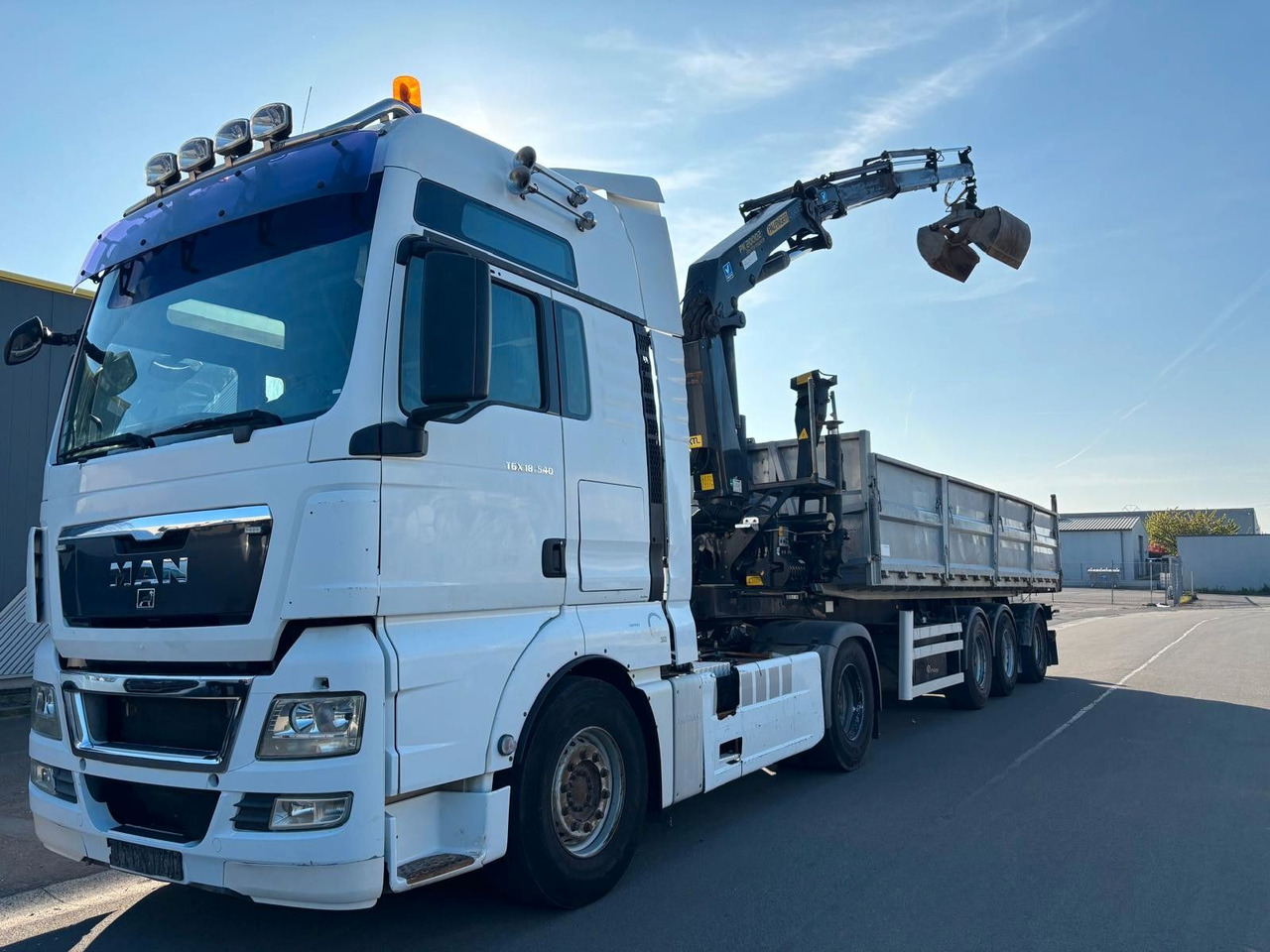 MAN TGX 18.540. Kipper + Kran PK20002. - Camion con gru: foto 2 MAN TGX 18.540. Kipper + Kran PK20002. - Camion con gru: foto 2